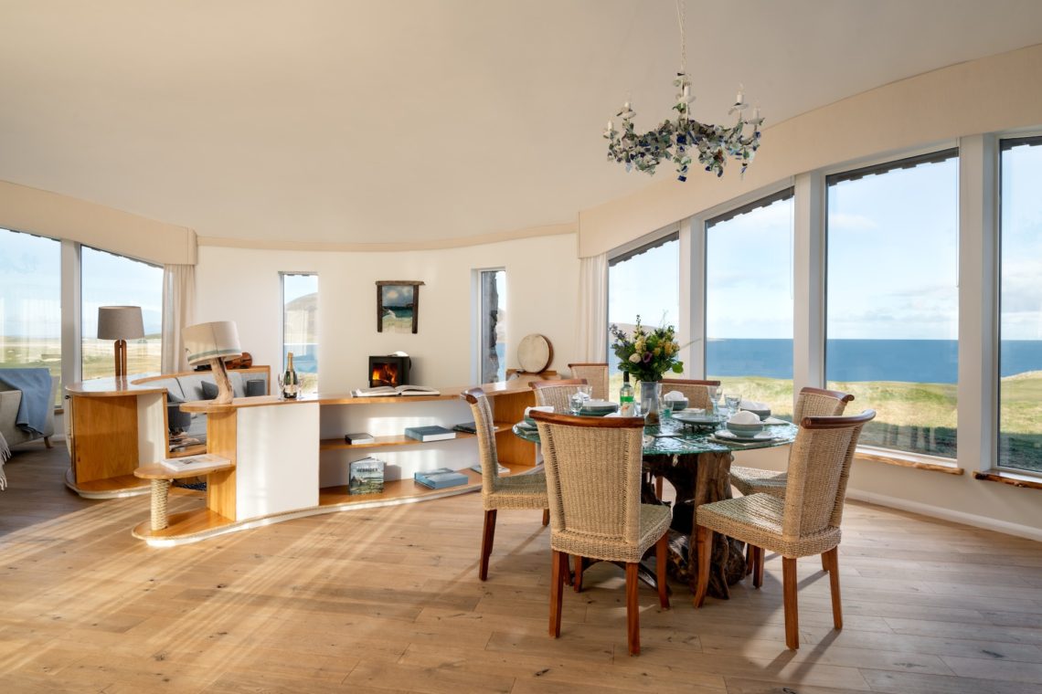bright open living room with views of isle of harris
