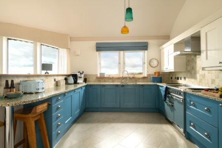 kitchen with blue cabinets